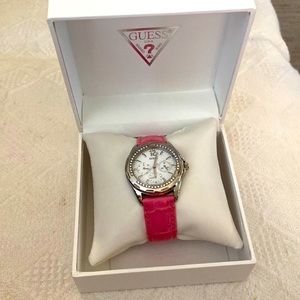 Guess Watch, alligator stamped pink leather, new batteries. New band.